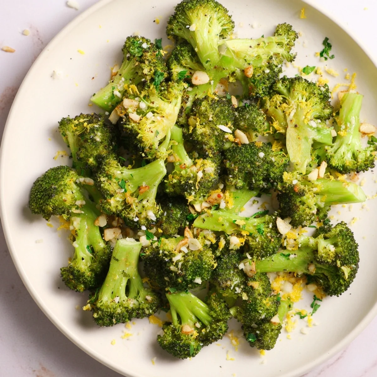 A delicious close-up of Roasted Broccoli with Garlic and Parmesan, ready to serve on a platter.