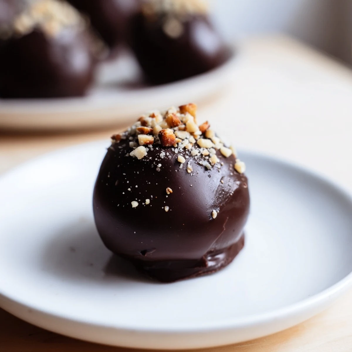 These homemade Irish Cream Truffles with Dark Chocolate sit elegantly on a platter, perfect for a holiday dessert platter.