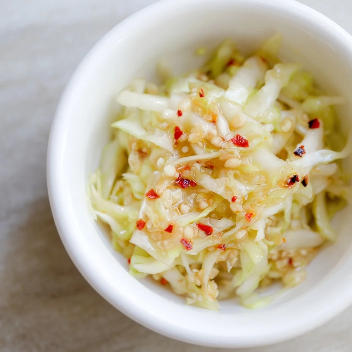 Homemade Best Asian Coleslaw Dressing with tangy rice vinegar, lime, and a hint of sriracha spice.