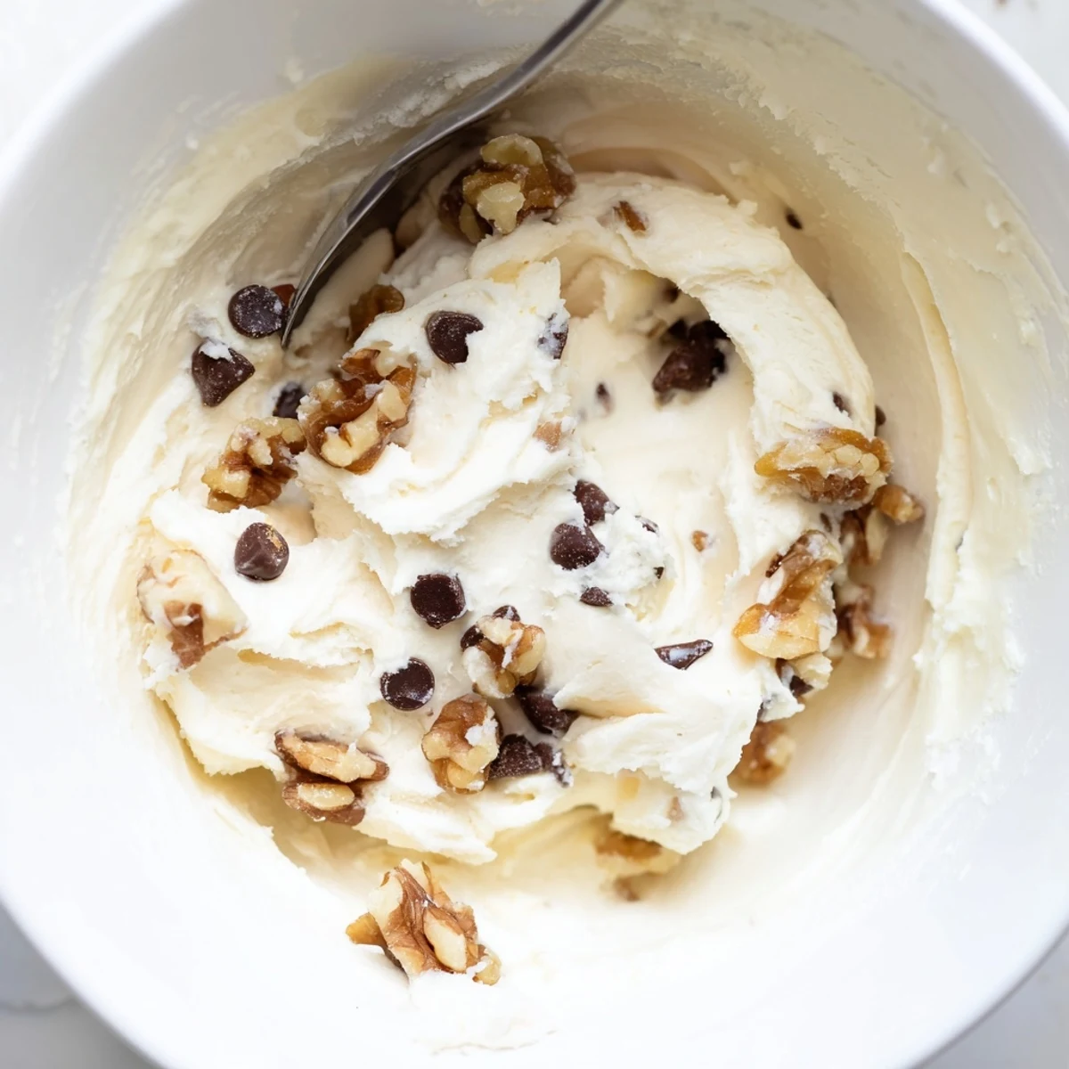 This scoop of Guilt Free Greek Yogurt Cookie Dough features a rich, thick texture, perfect for dipping apple slices or pretzels.