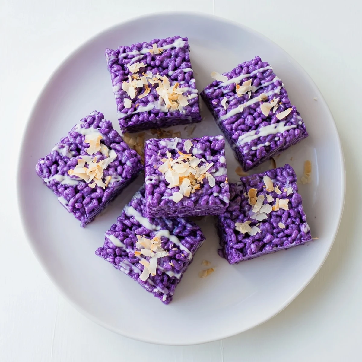 Homemade ube rice krispie treats showing vibrant purple color and crispy texture in close-up view