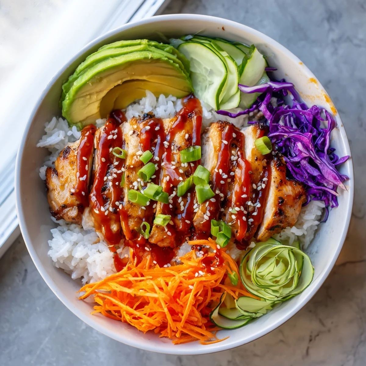 Golden grilled Korean BBQ chicken bowls with colorful vegetables and spicy gochujang mayo drizzle