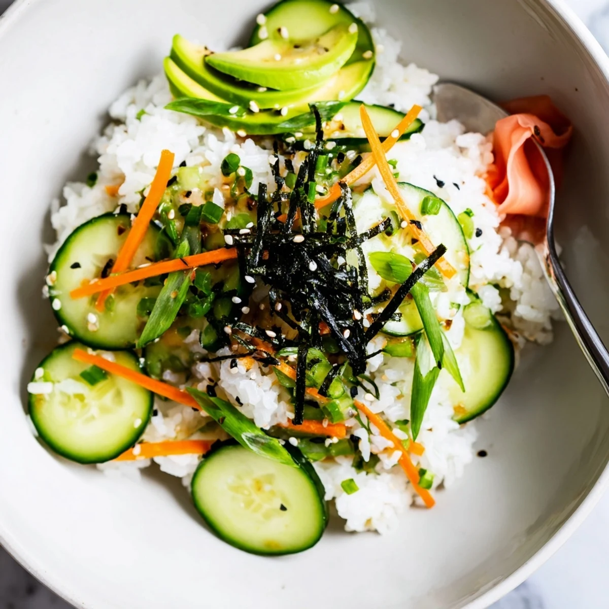 Sushi Cucumber Salad with glossy nori strips and chilled sesame-dressed cucumbers