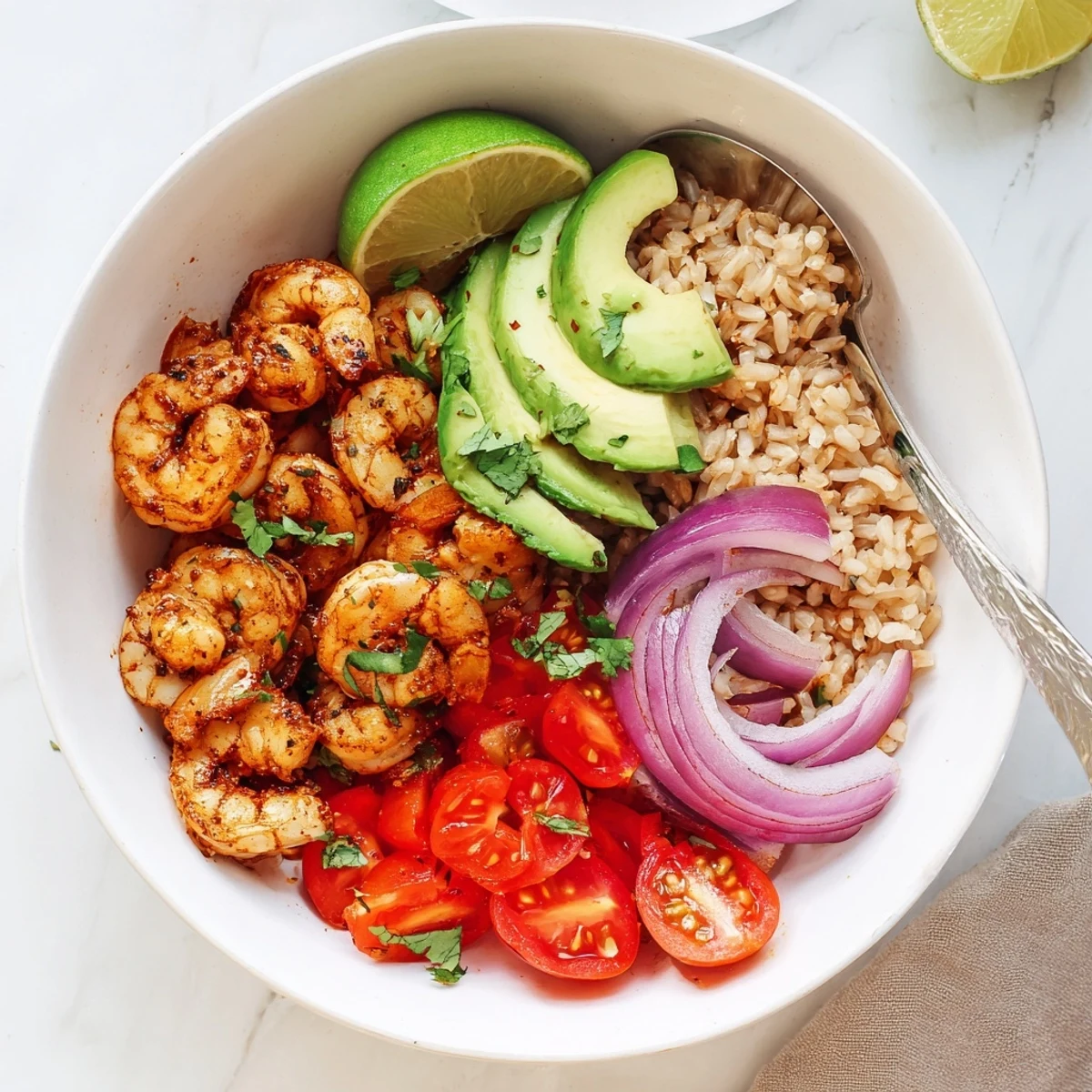Easy Garlic Shrimp Bowl recipe, garlicky sautéed shrimp beside sliced cucumber