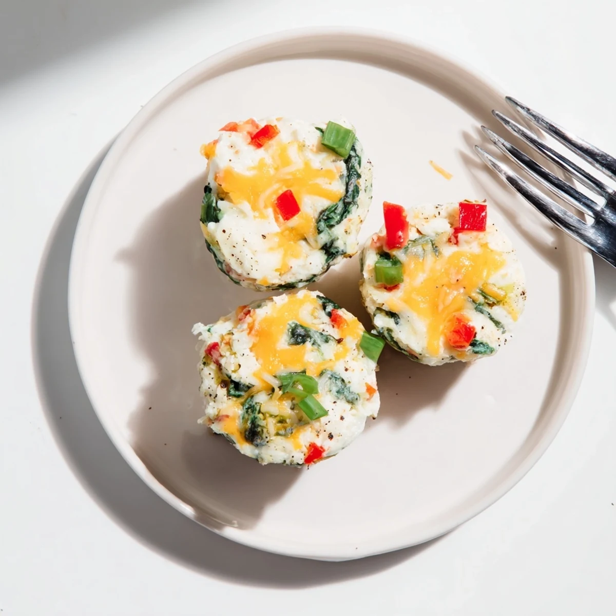 Warm High Protein Egg White Bites With Cottage Cheese on plate.