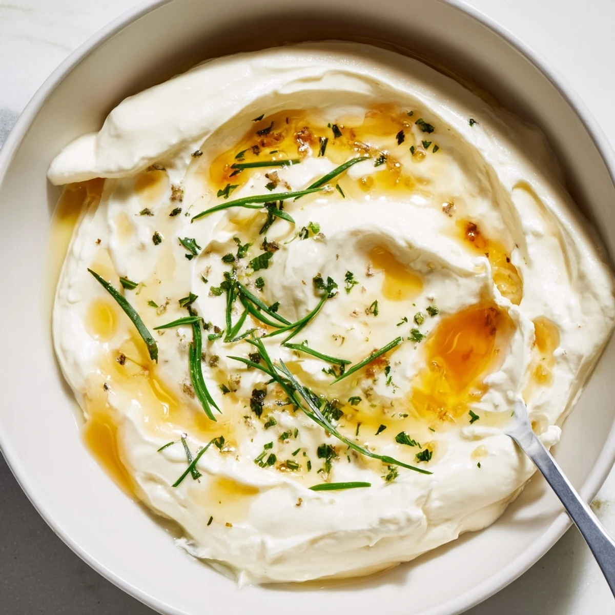 Creamy Hot Honey Ranch Dip bursting with tangy herbs, perfect for wings