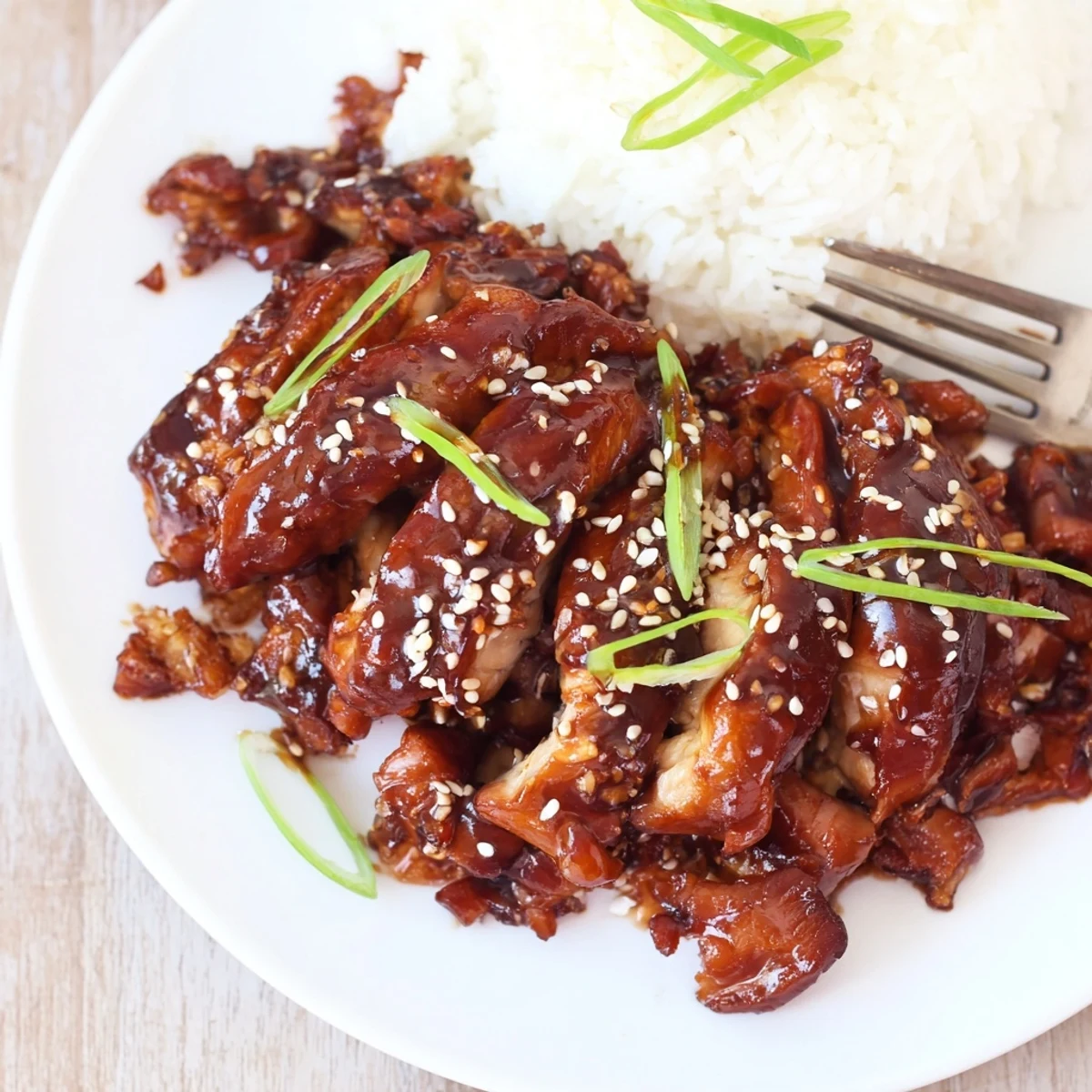 Oven roasted Char Siu Chicken piled on platter, honey hoisin glaze shining