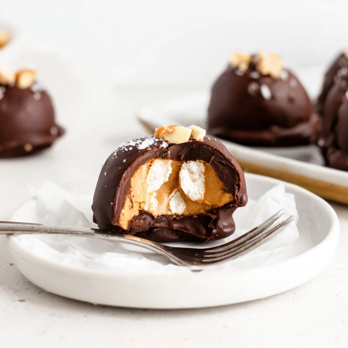 Stacked Frozen Peanut Butter Greek Yogurt Bites Dipped In Dark Chocolate With Sea Salt