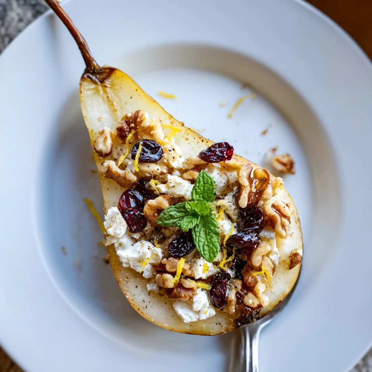 Tender Baked Pears With Feta Honey Cranberries served warm with creamy Greek yogurt