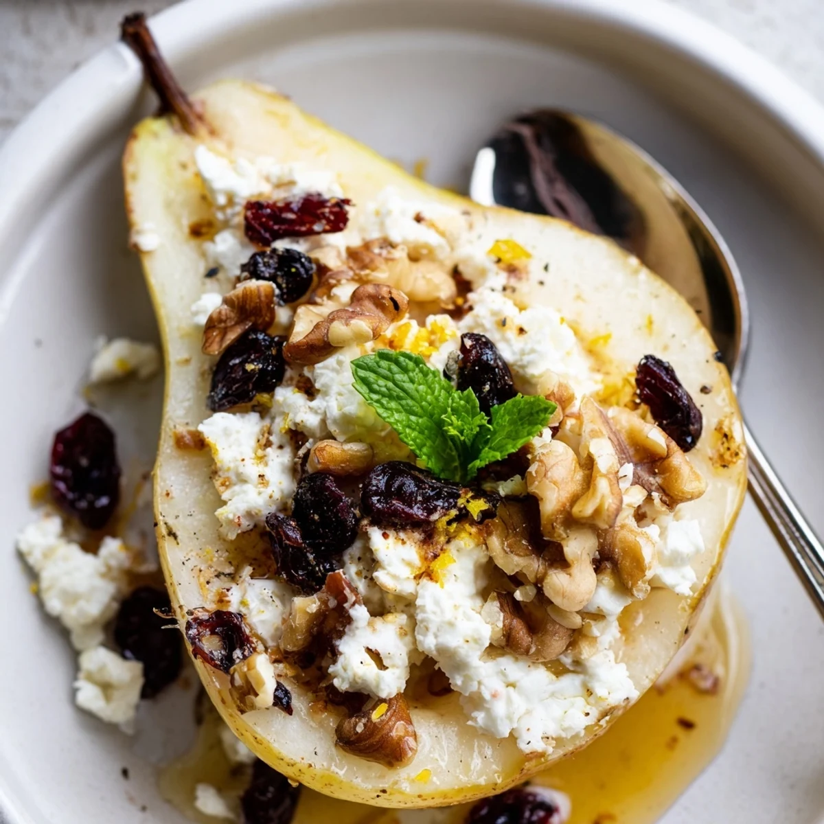 Caramelized Baked Pears With Feta Honey Cranberries resting in parchment-lined baking dish  