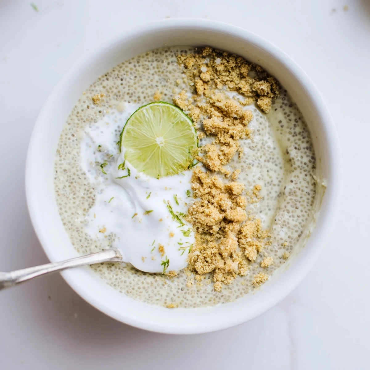 Key Lime Chia Pudding in glass jars, creamy texture with bright lime zest.