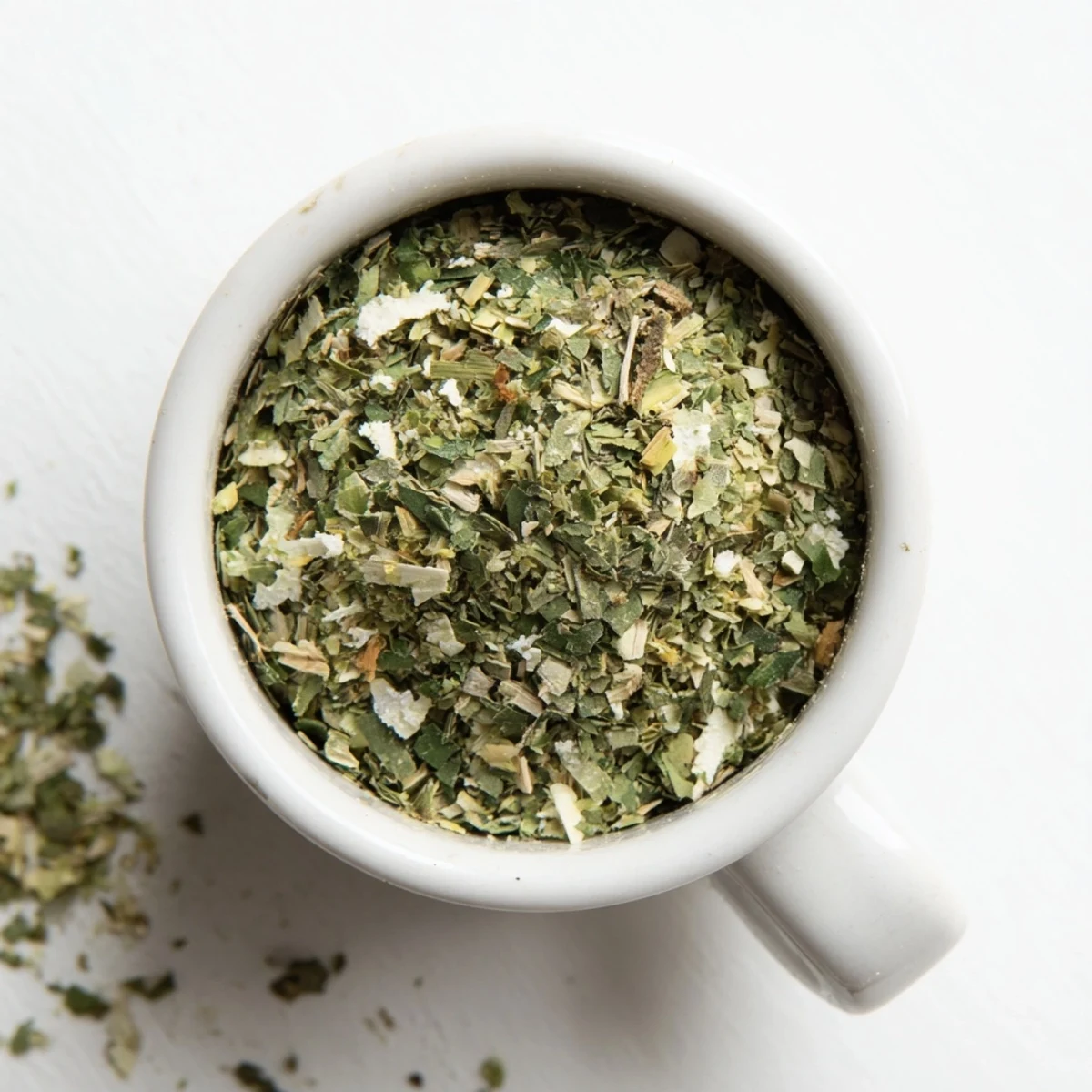 Wooden bowl of Dehydrated Tzatziki Seasoning Mix, ready to sprinkle on grilled vegetables